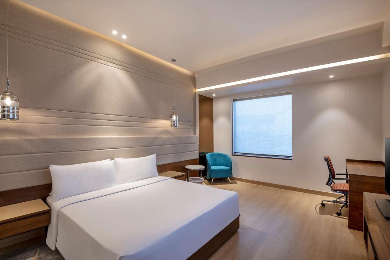 Hotel Radisson Blu Towers Kaushambi Delhi Ncr Ghaziabád Exteriér fotografie A room at the hotel