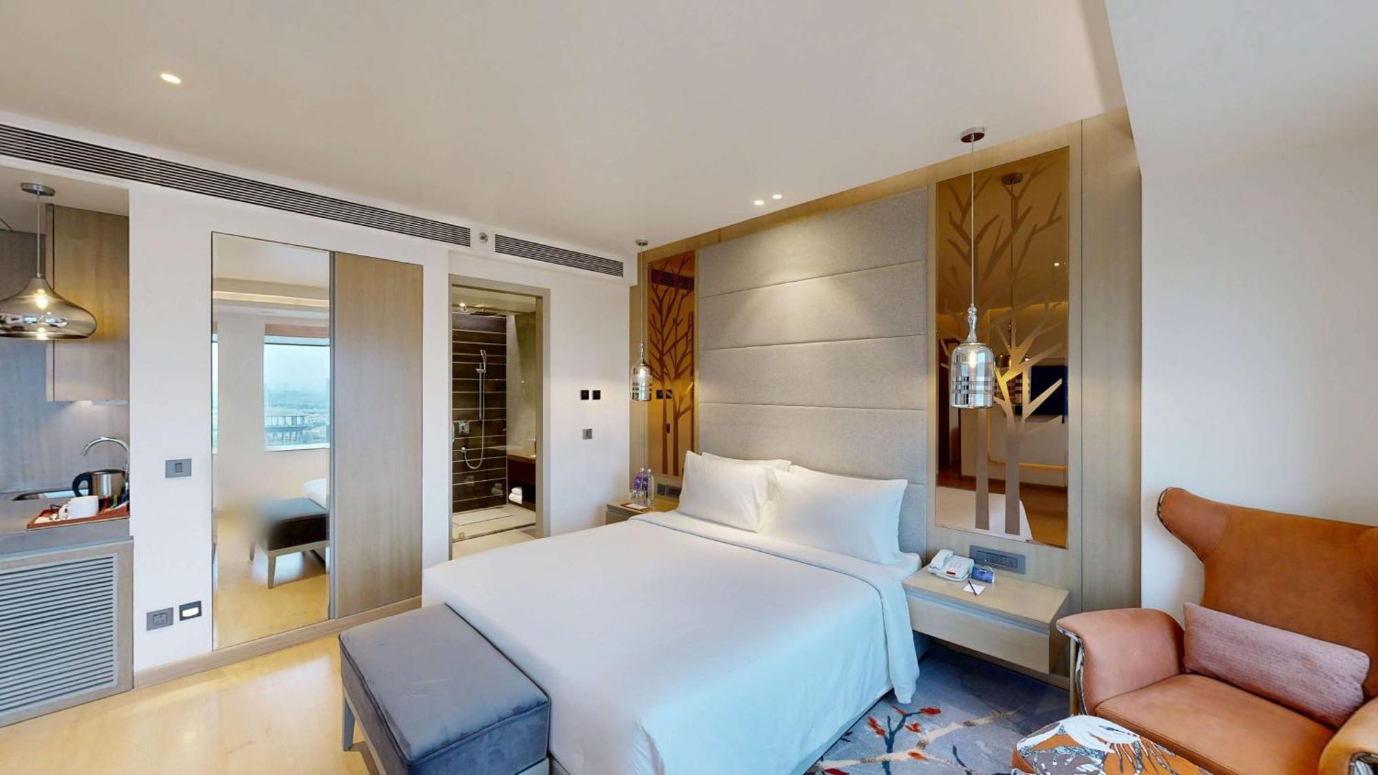 Hotel Radisson Blu Towers Kaushambi Delhi Ncr Ghaziabád Exteriér fotografie A bedroom at the hotel